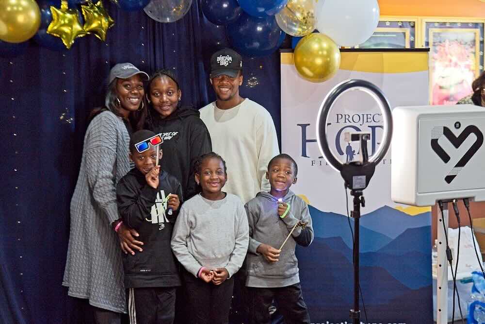A family with kids at a Projecting Hope event